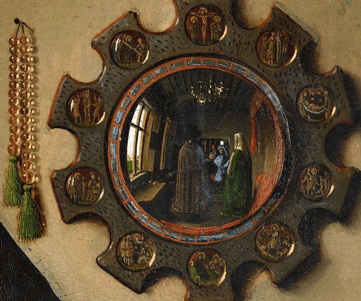 Figure 22: Detail of mirror from The Marriage Giovanni Arnolfini. The window, the couple’s backsides, as well as the artist himself are visible in the convex mirror.